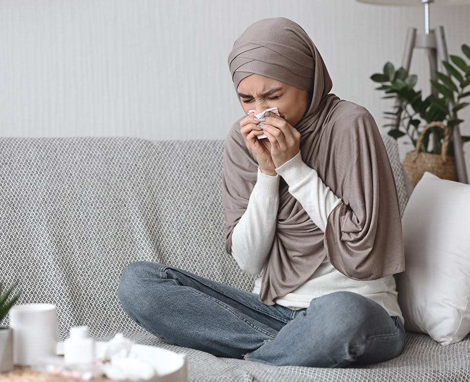 A woman with a cold A woman with a cold