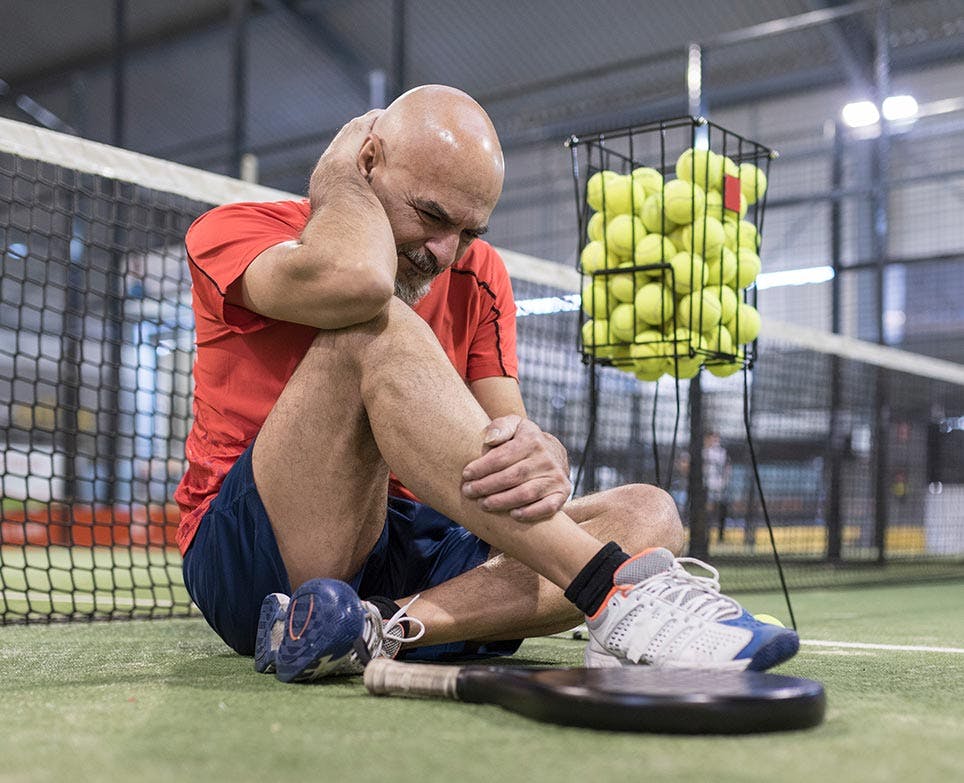 an athlete dealing with muscle aches an athlete dealing with muscle aches