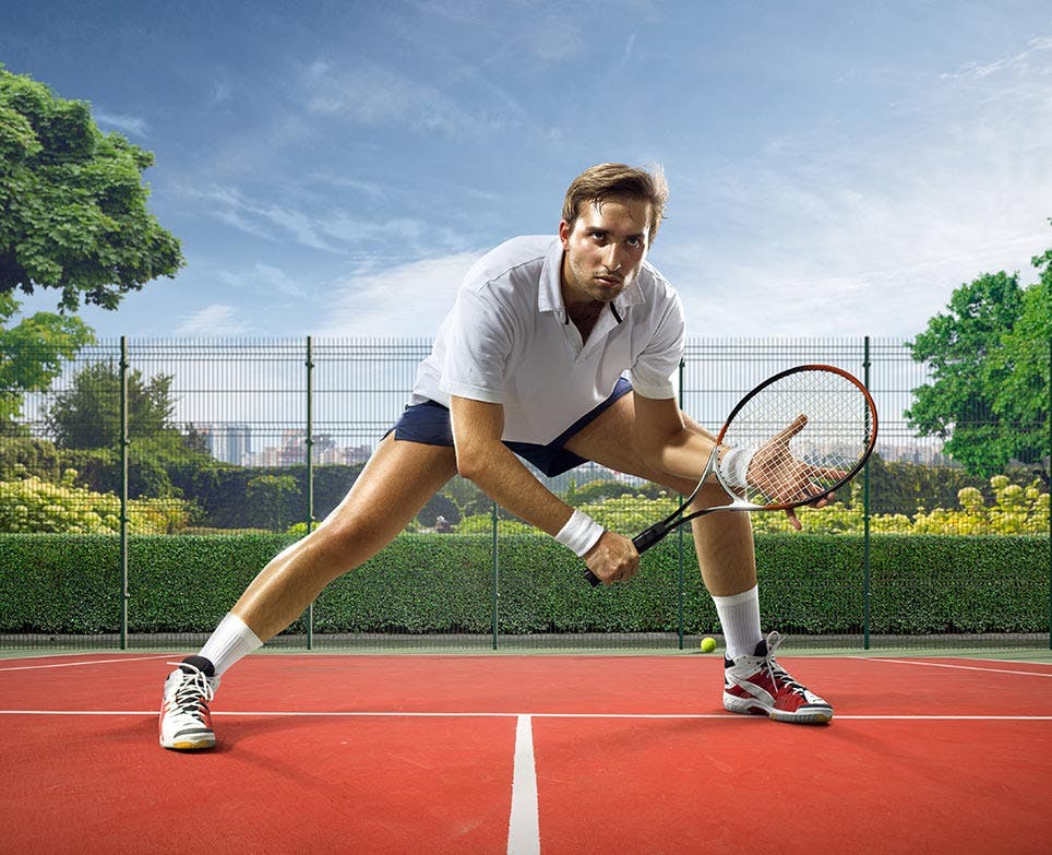 A man playing tennis A man playing tennis