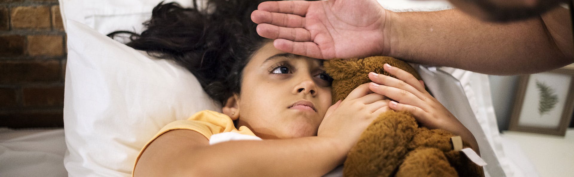 a girl suffering from high fever a girl suffering from high fever