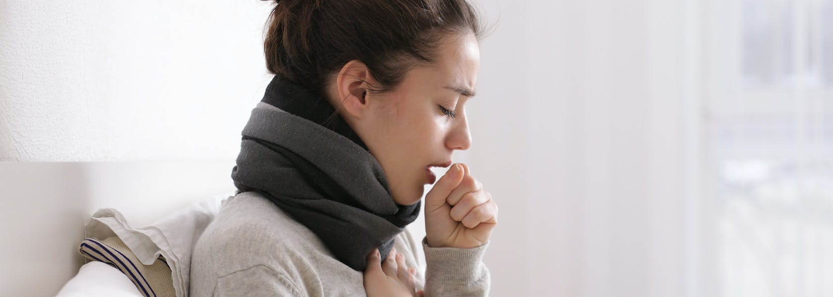 Woman with cough symptoms. Woman with cough symptoms.
