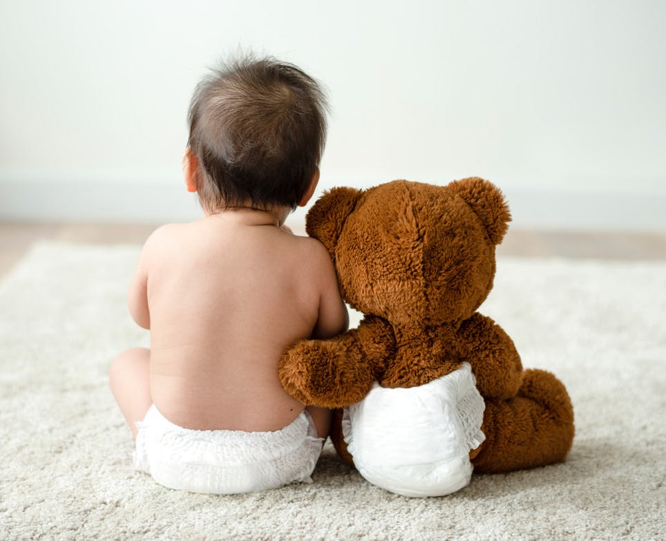 Baby and a teddybear