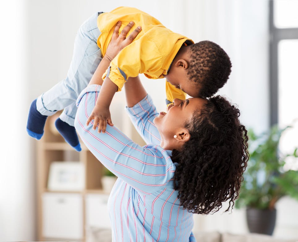 Woman holding her child