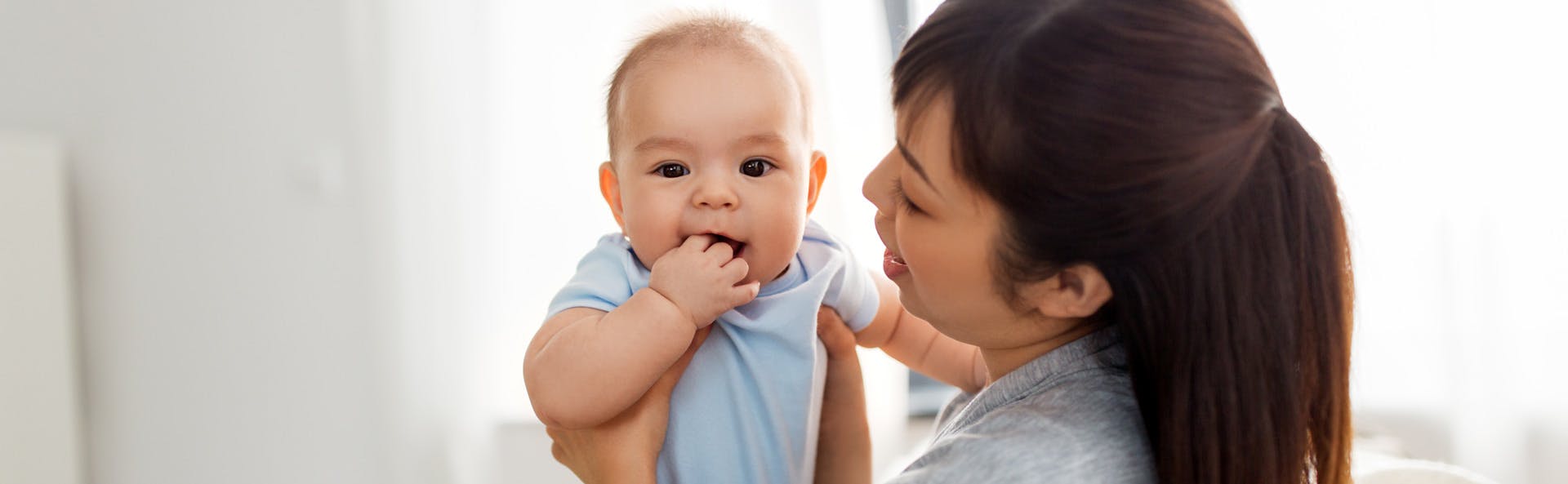 Woman holding her child