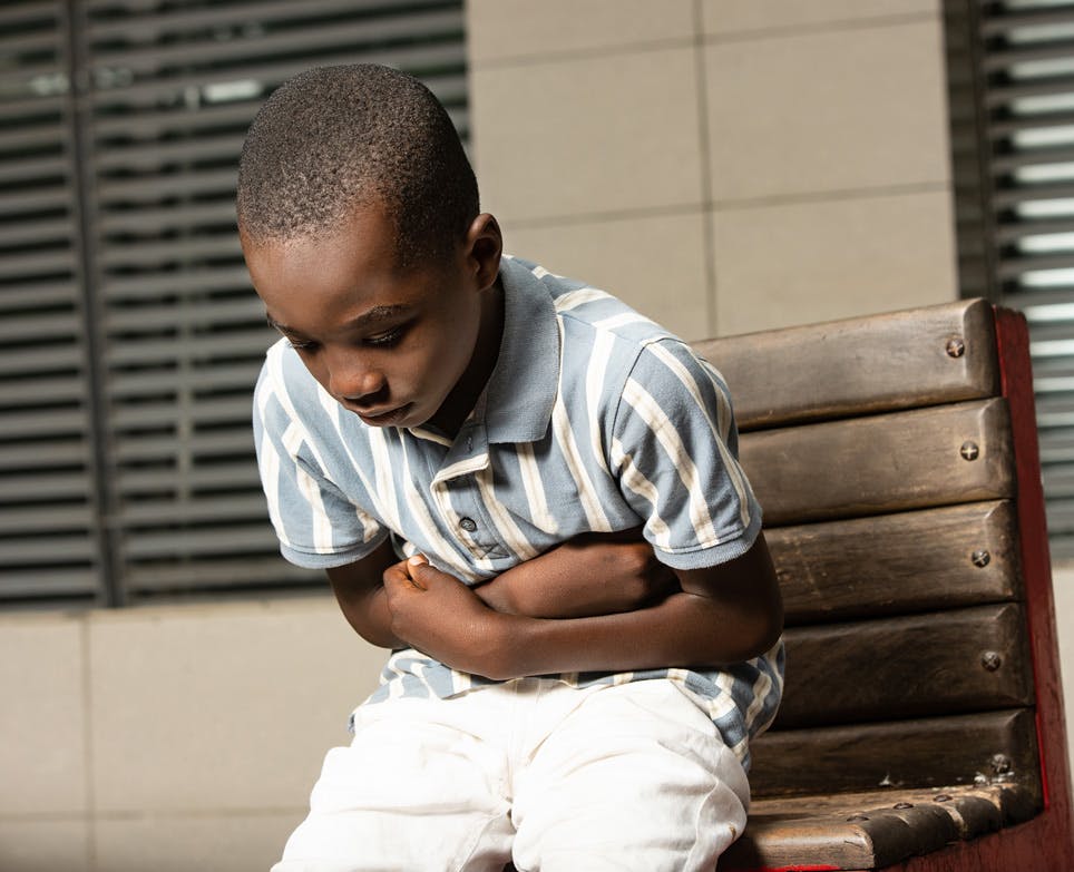 A boy having stomach ache