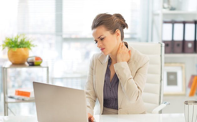 Woman experiencing headache