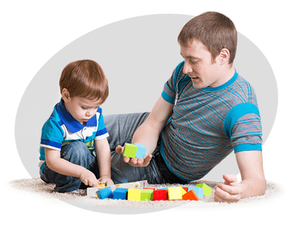 Dad With His Son Play Together At Home