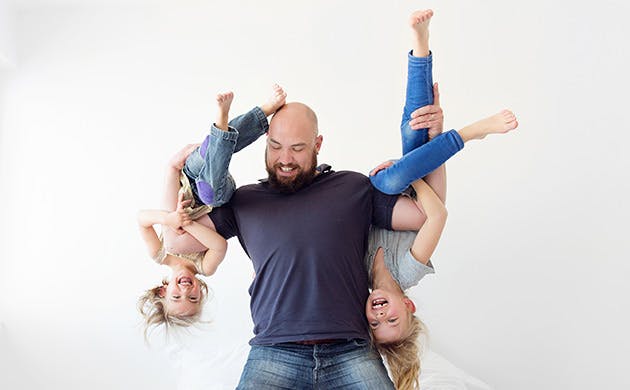 Father Wrestling With This Daughters At Home