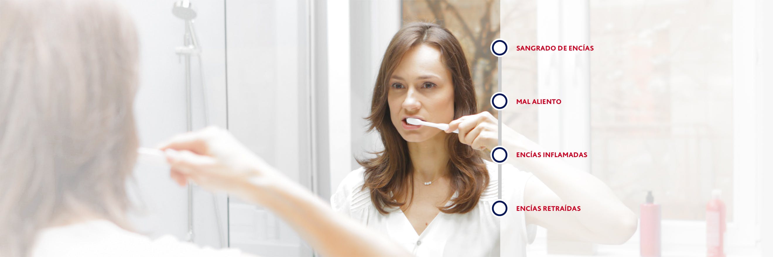 Mulher a lavar os dentes