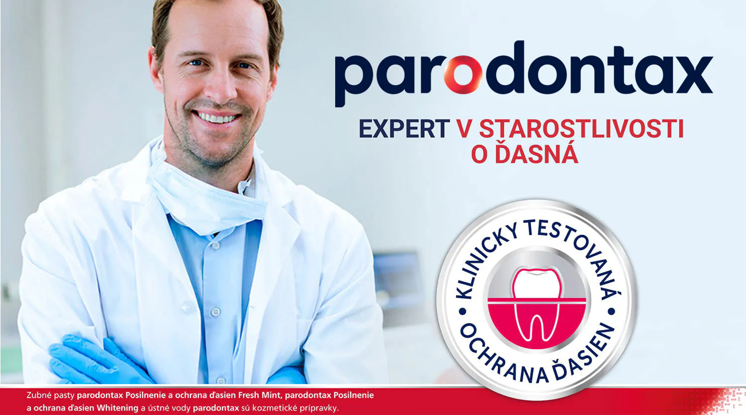 Muž s rúškom a bielym plášťom a pečaťou s textom klinicky testovaná ochrana ďasien