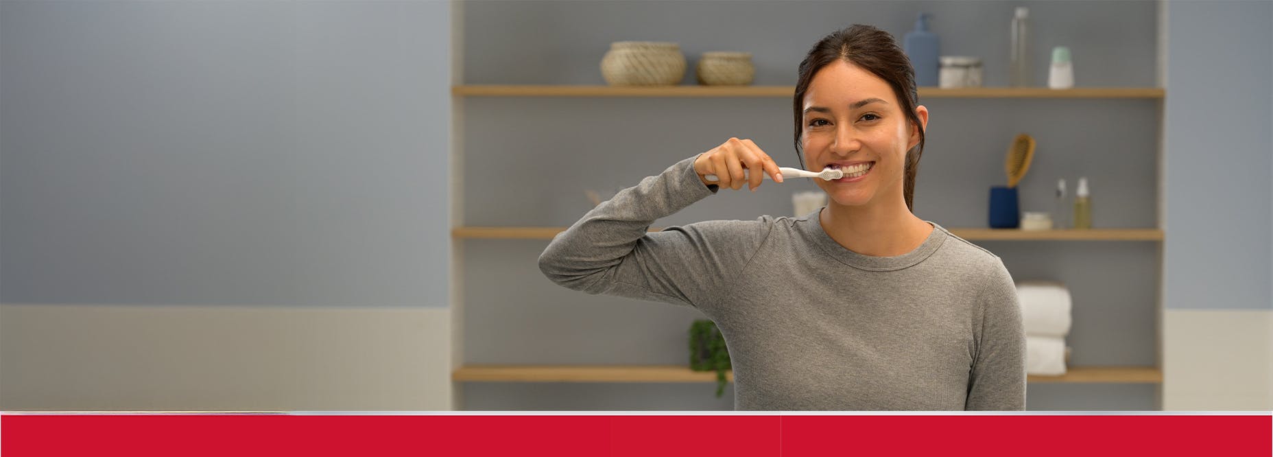 woman brushing her teeth