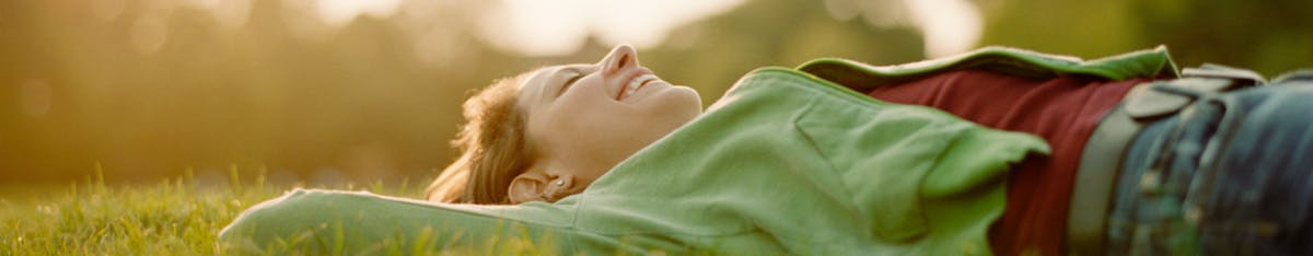 Woman lying in field Woman lying in field