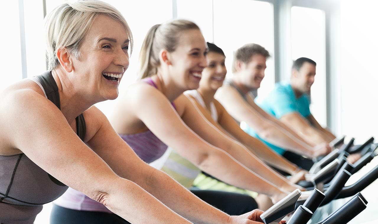 Woman exercising with friends