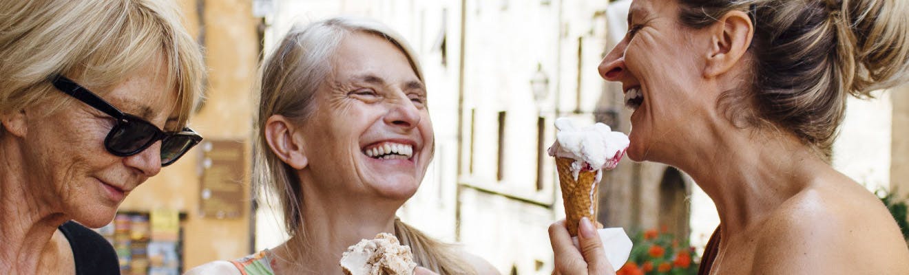 three women eating ice cream