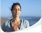 Image of woman running on the beach