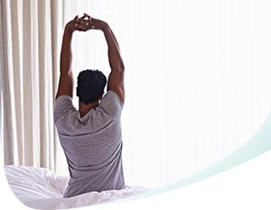 Man doing morning stretches