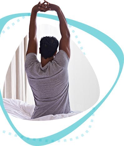 Man doing morning stretches Man doing morning stretches