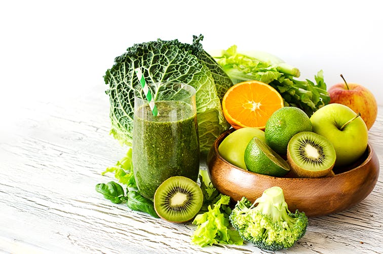 Bowl of Acidic Fruits and Green Smoothie