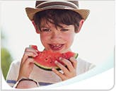 Boy Eating Watermelon Header Callout Mobile