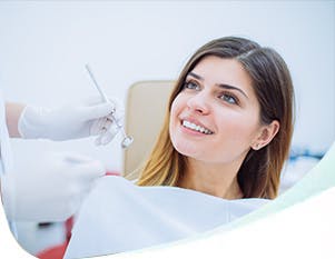 dentist checking girl