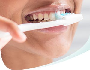 Brushing Teeth with Pronamel Toothpaste Callout