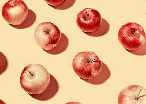 Apples on a yellow background