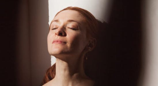 Calm woman taking a deep breath Calm woman taking a deep breath