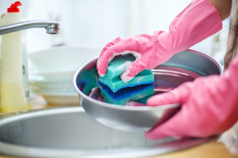 Dentist cleaning her supplies