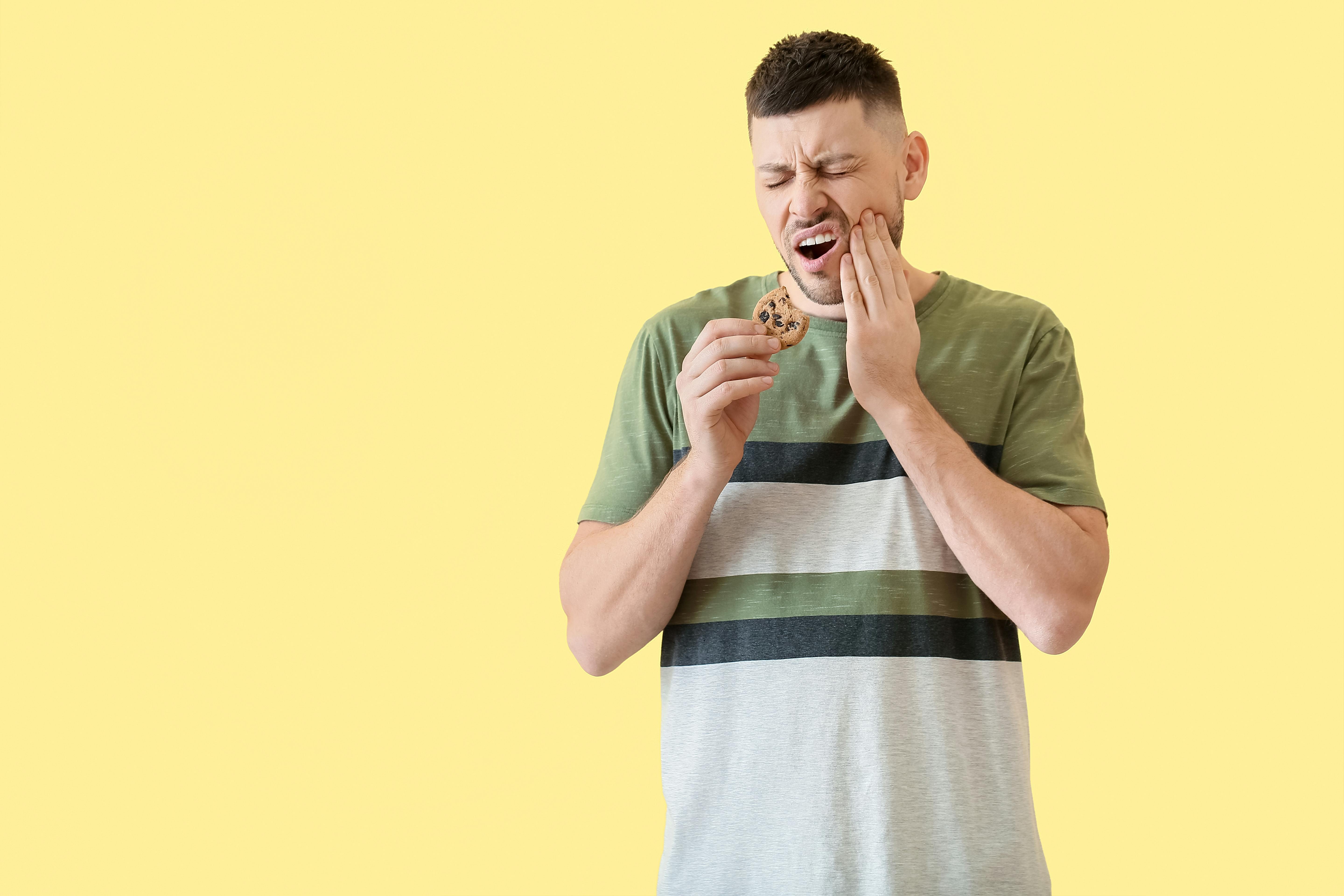Man experiences tooth pain after biting into cookie
