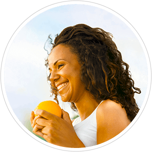 Woman eating fruit