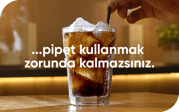 Soft drink, ice and a straw