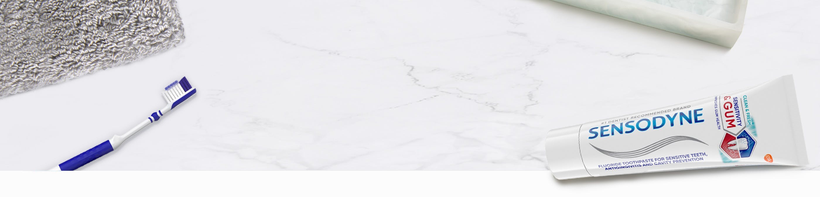 sensodyne sensitivity and gum toothpaste on counter