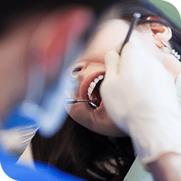 Woman receiving dental treatment