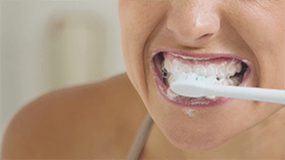 Behandelen van gevoelige tanden