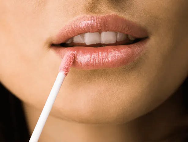 Women caring her lips Women caring her lips