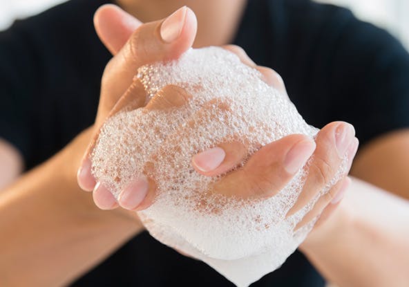 Washing hands with soap