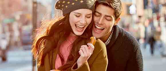 man and woman being playful on a date man and woman being playful on a date