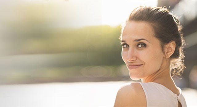 Woman looking back. Dealing with cold sores | Abreva