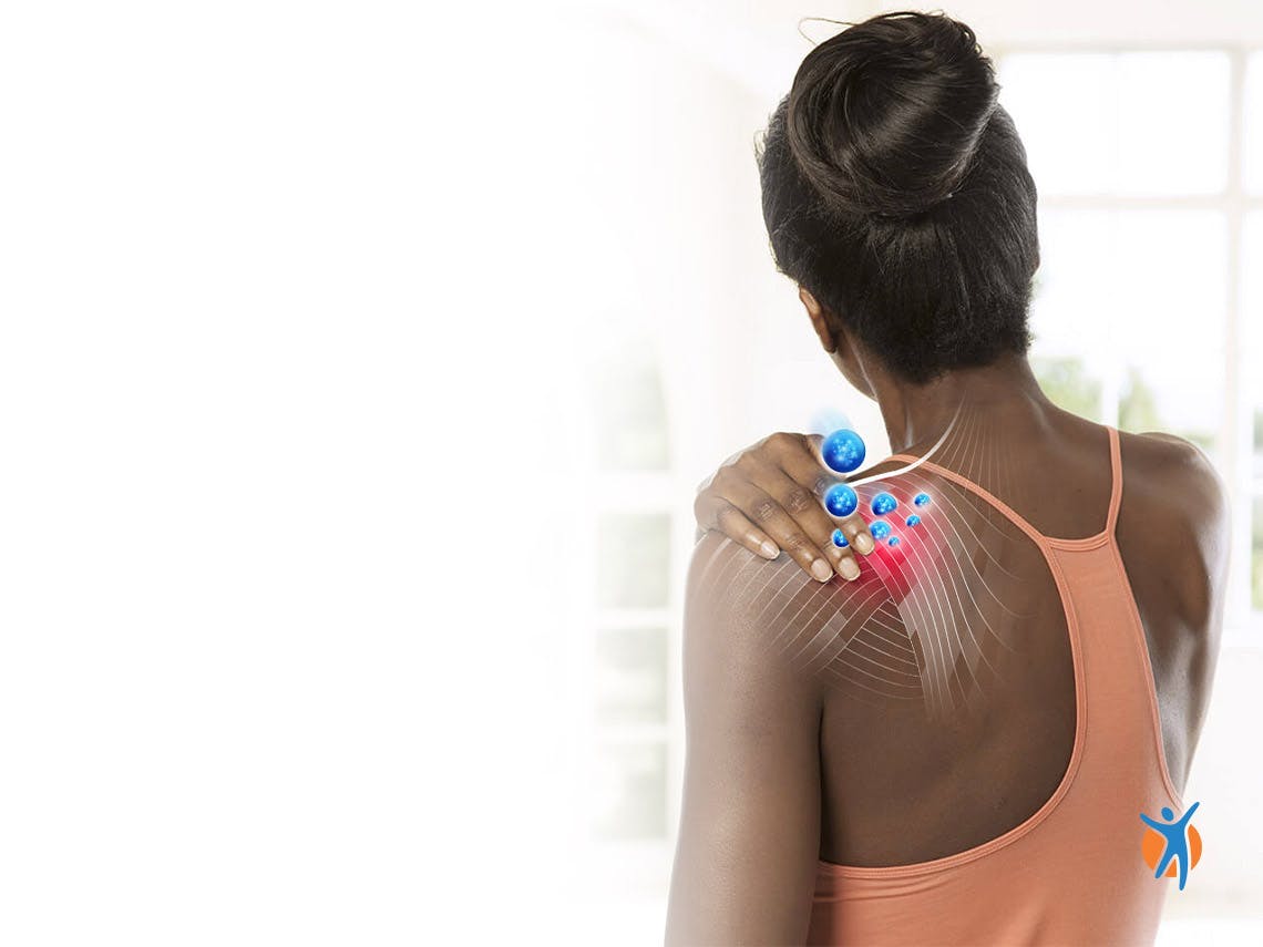 Woman using Voltaren pain relief gel to relieve shoulder pain