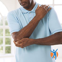 Man with elbow pain - learn about joint pain and how to manage the symptoms