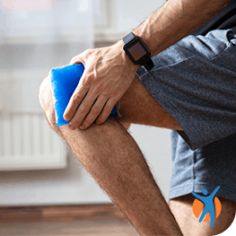 Find self care methods for your pain Man uses ice pack on knee pain as part of RICE method