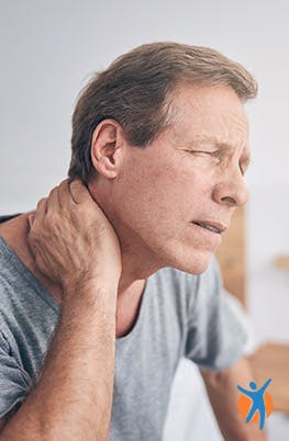 Man wakes up from sleep with neck pain