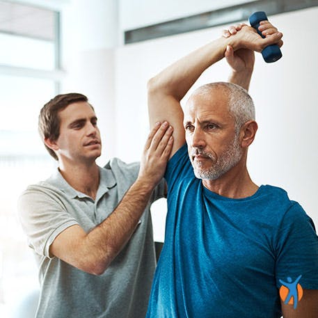 A man receiving physio therapy to help manage his pain 