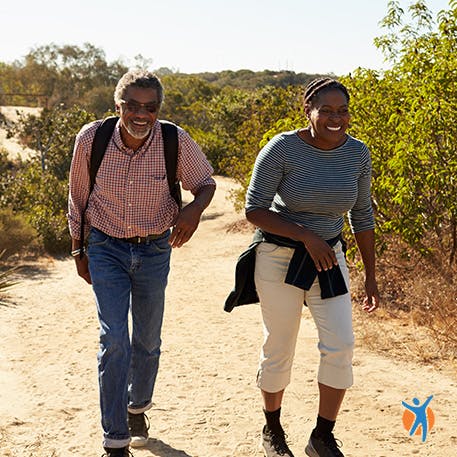 Enjoy things you love without foot or ankle pain A couple out on a hike - using well-fitting shoes helps avoid ankle pain when walking