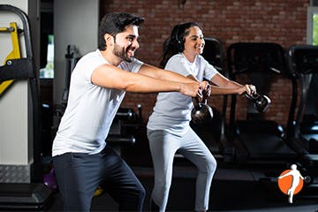 An older couple jogging outside Man and woman exercising together
