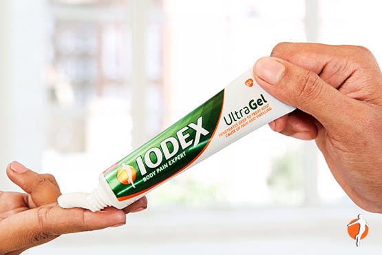 Person applying Iodex UltraGel