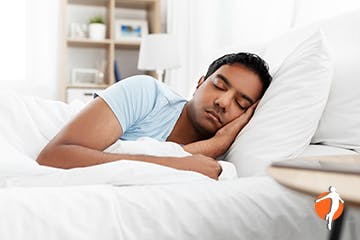 Getting rest Man sleeping in bed