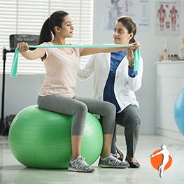Exercising with bands Woman exercising with bands in company of doctor