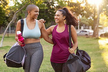 Two women outside after a workout Two women outside after a workout