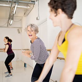 Two women enjoying an exercise class free from joint pain